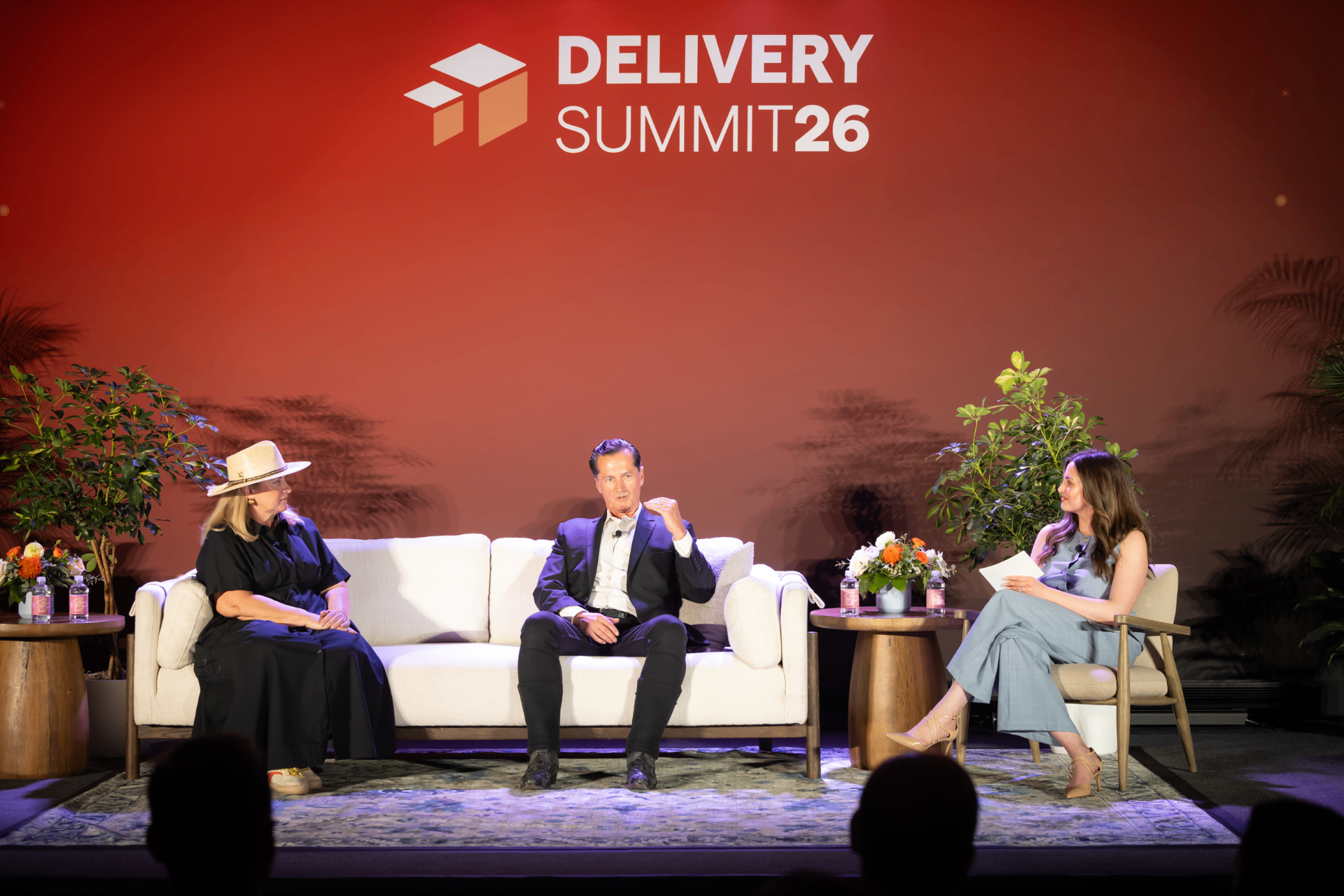 Alexia McLaughlin moderating a fireside chat at Delivery Summit '26